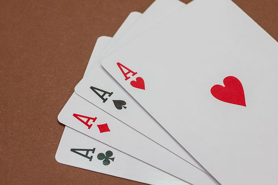 four Ace playing cards on brown surface, poker, card game, play poker, HD wallpaper