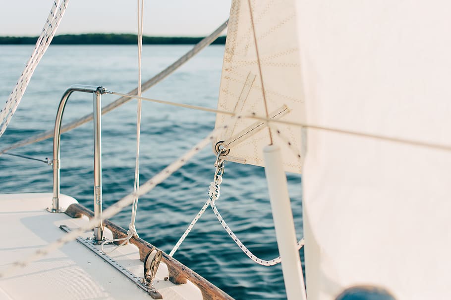 white and gray boat on body of water, close up photo of boat rail HD wallpaper