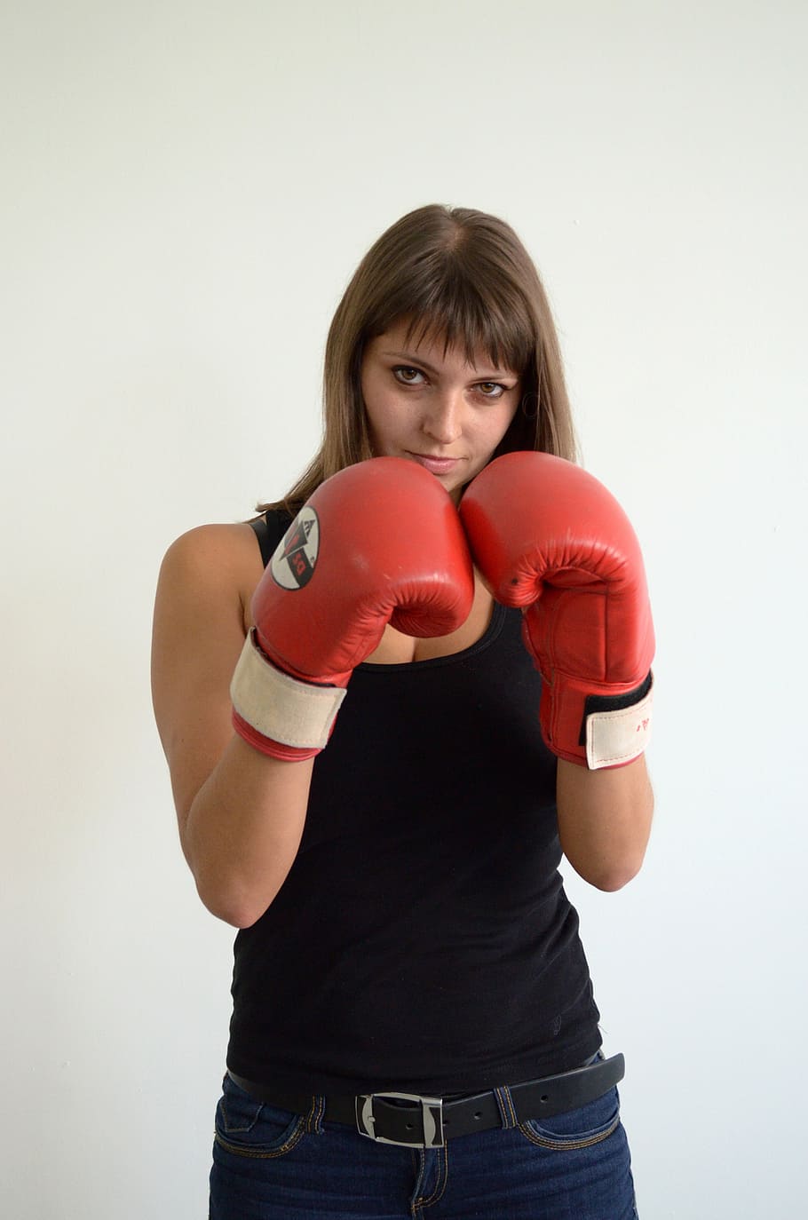 woman standing while wearing red boxing gloves near wall, girl HD wallpaper