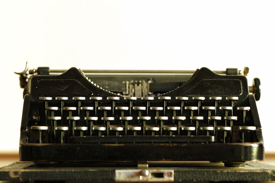vintage black typewriter on brown top, old, nostalgia, style