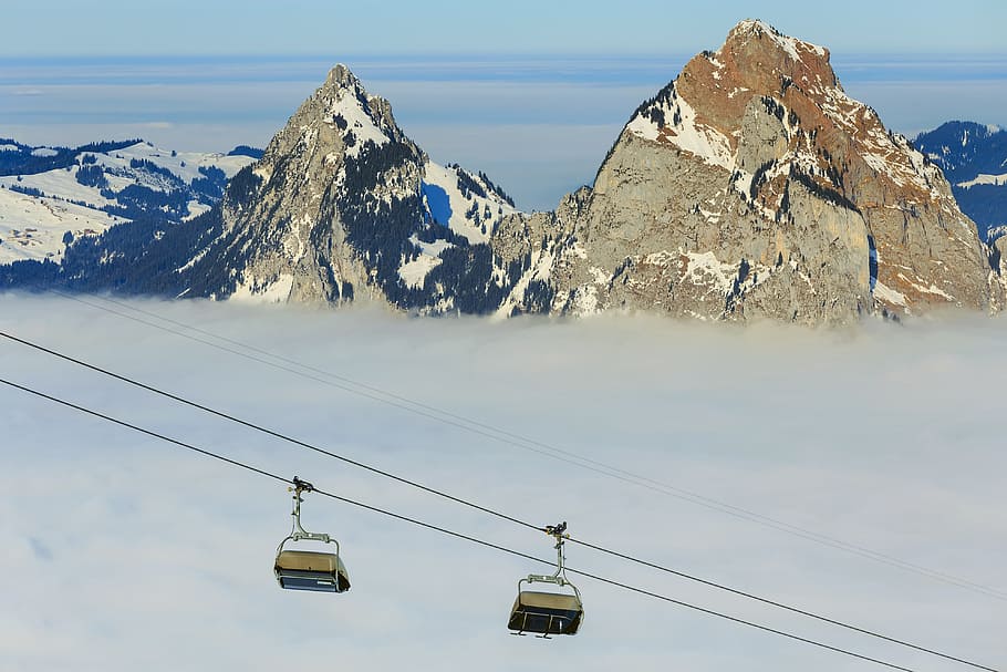 two cable cars on cables at daytime, chair lift, ski lift, ropeway