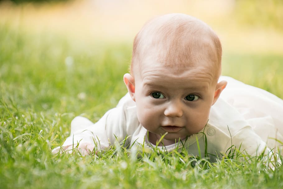 baby lying on green grass field during daytime, child, nature HD wallpaper