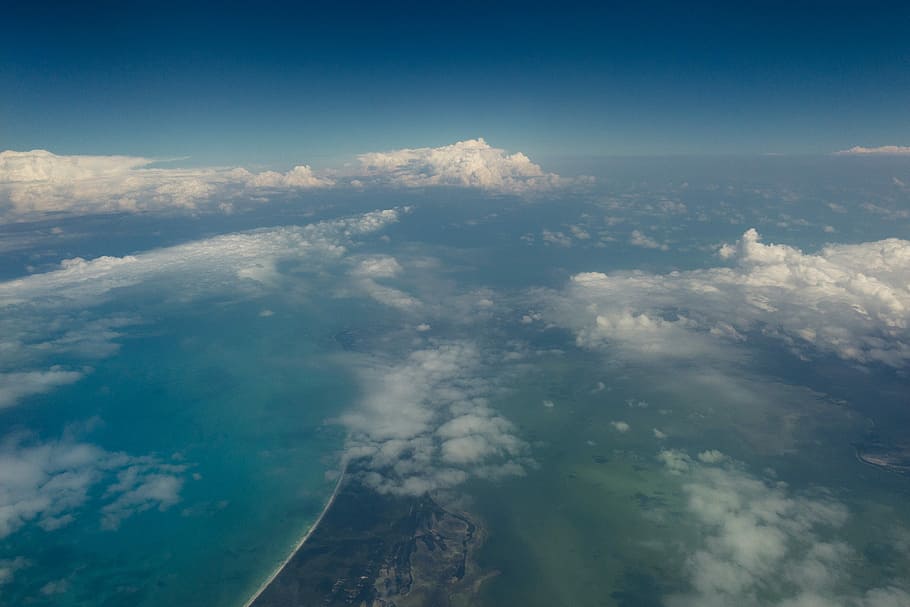 top view of island, aerial photo of body of water, sea, ocean