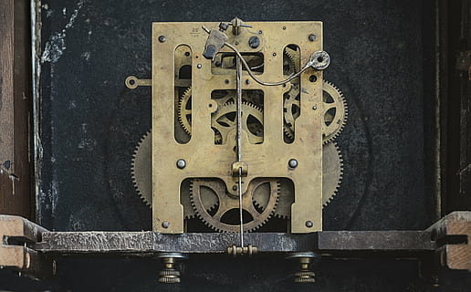 closeup photo of brass-colored tool part, clock, gears, inside HD wallpaper