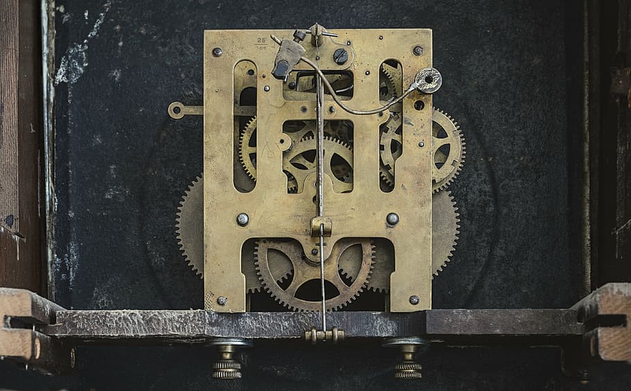 closeup photo of brass-colored tool part, clock, gears, inside HD wallpaper