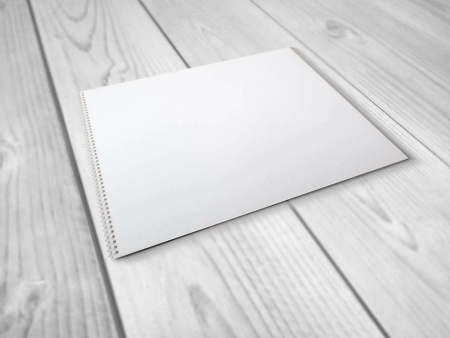 spiral notepad placed on gray surfacer, album, sheet, notebook HD wallpaper