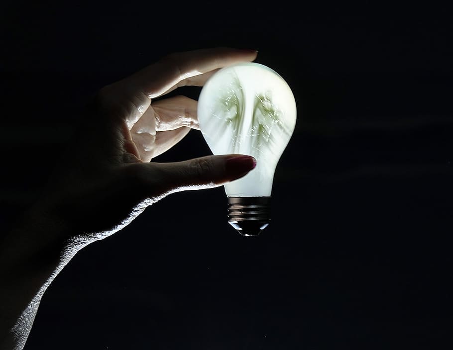 Light Bulb, Hand, Electricity, black background, human body part HD wallpaper