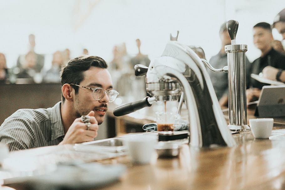 man in front of coffeemaker, machine, hot, drink, brewed, espresso HD wallpaper