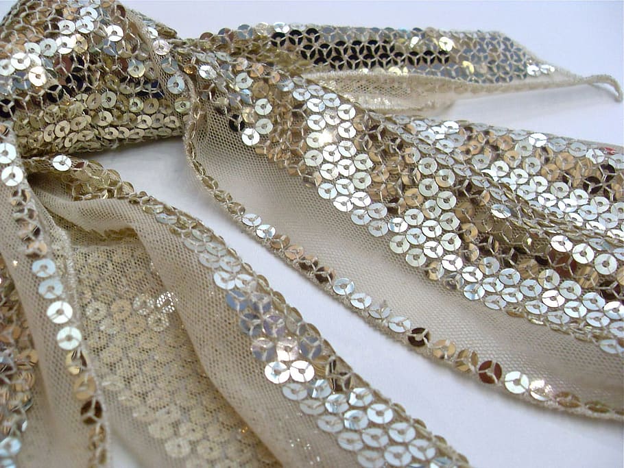 gold sequined scarf on white surface, Close-Up, Macro, Sequins HD wallpaper