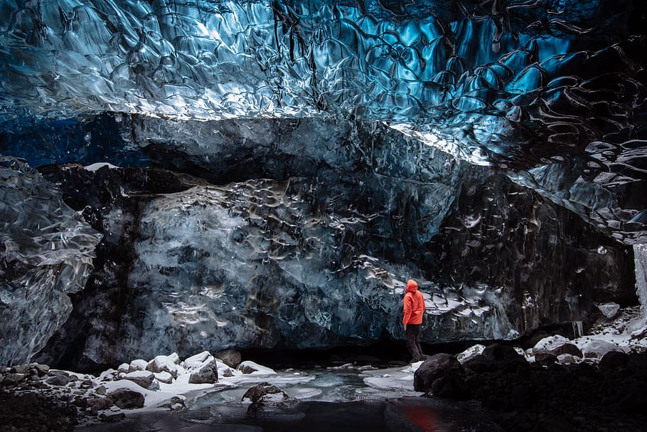 person standing in front of cave, adventure, cold, fun, ice HD wallpaper
