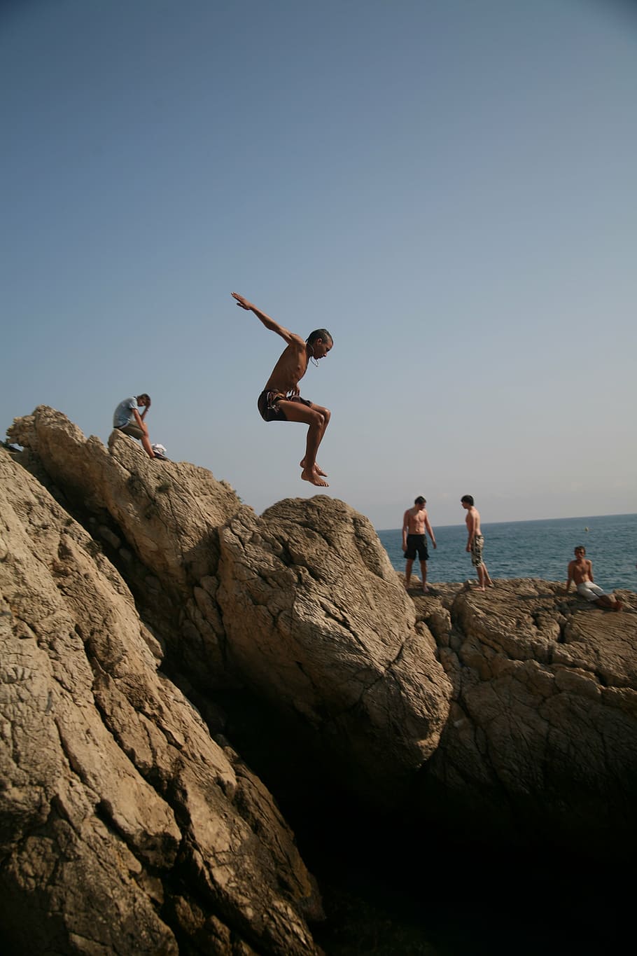 jump, diving, sea, action, sky, solid, rock, clear sky, rock - object HD wallpaper