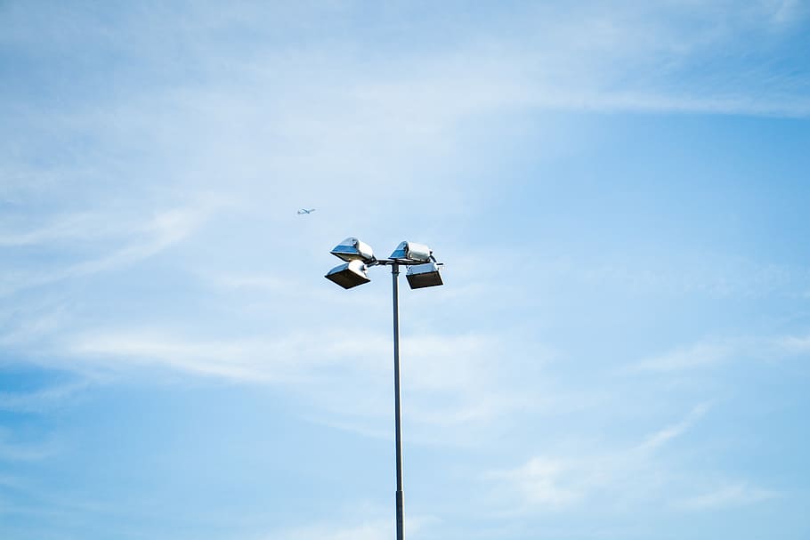close up photography of post lamp under blue sky, low angle of light post HD wallpaper