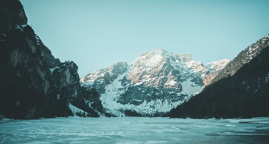 body of water near mountains, snow covered mountain under blue sky HD wallpaper