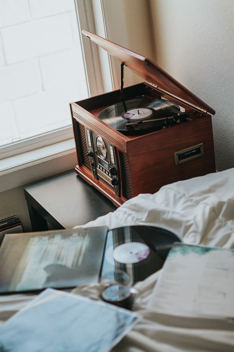 brown wooden radiogram, brown and black vinyl player beside window HD wallpaper