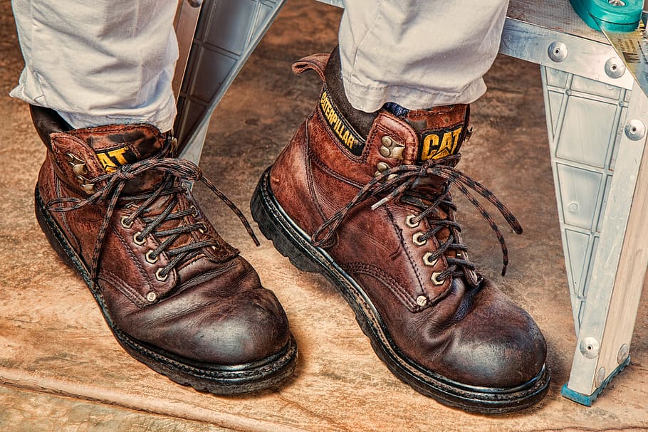 person in brown pants with brown Caterpillar leather work boots, HD wallpaper