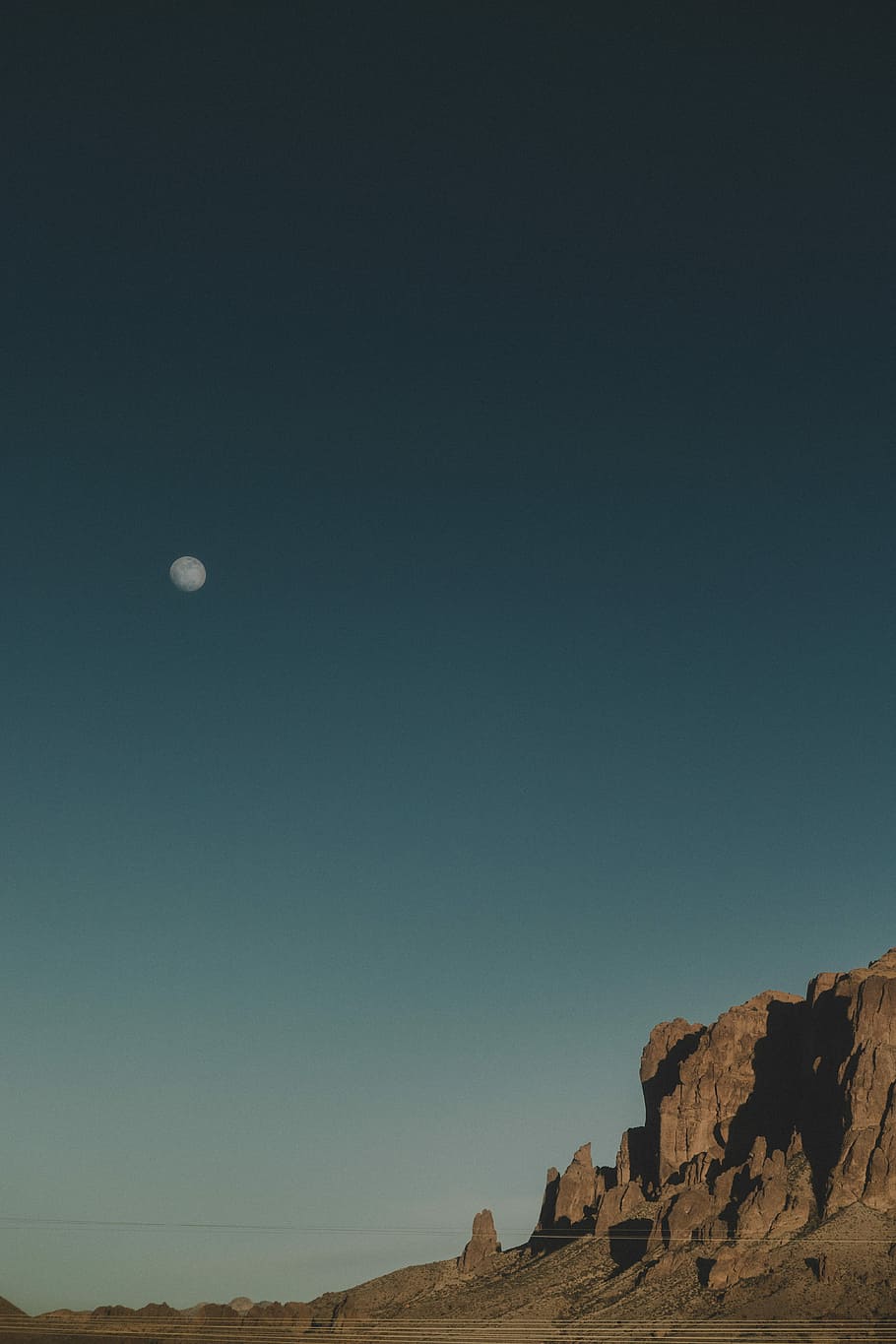 rock formation under clear skies and moon, white moon and desert HD wallpaper