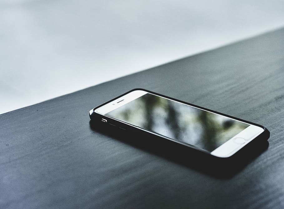Starbucks, silver iPhone 6 and black case on black wooden top HD wallpaper