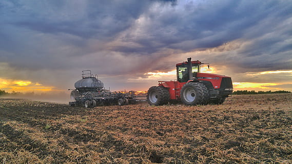 sunset, clouds, tractor, planter, seeder, field, tires, sky HD wallpaper