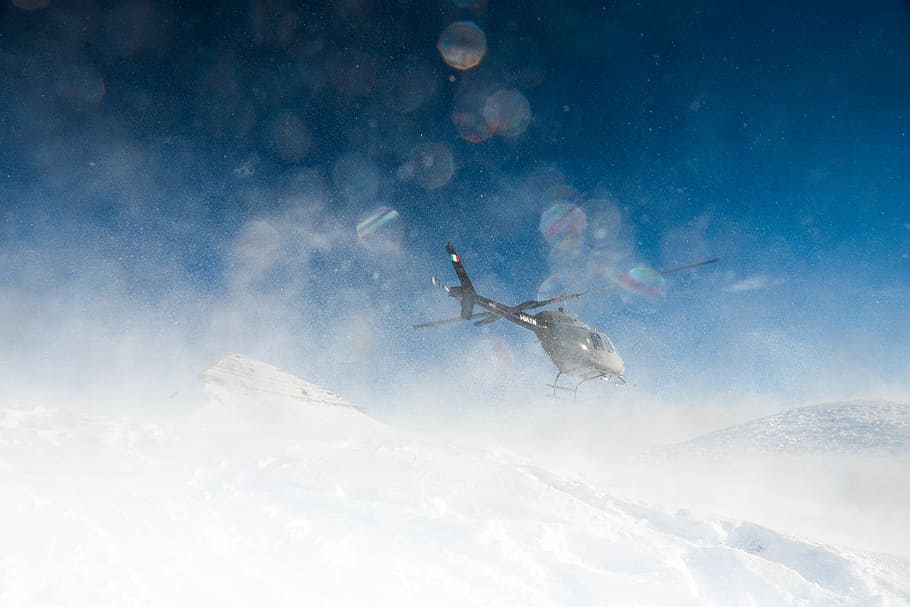 helicopter hovering on snow, photo of gray helicopter during winter HD wallpaper