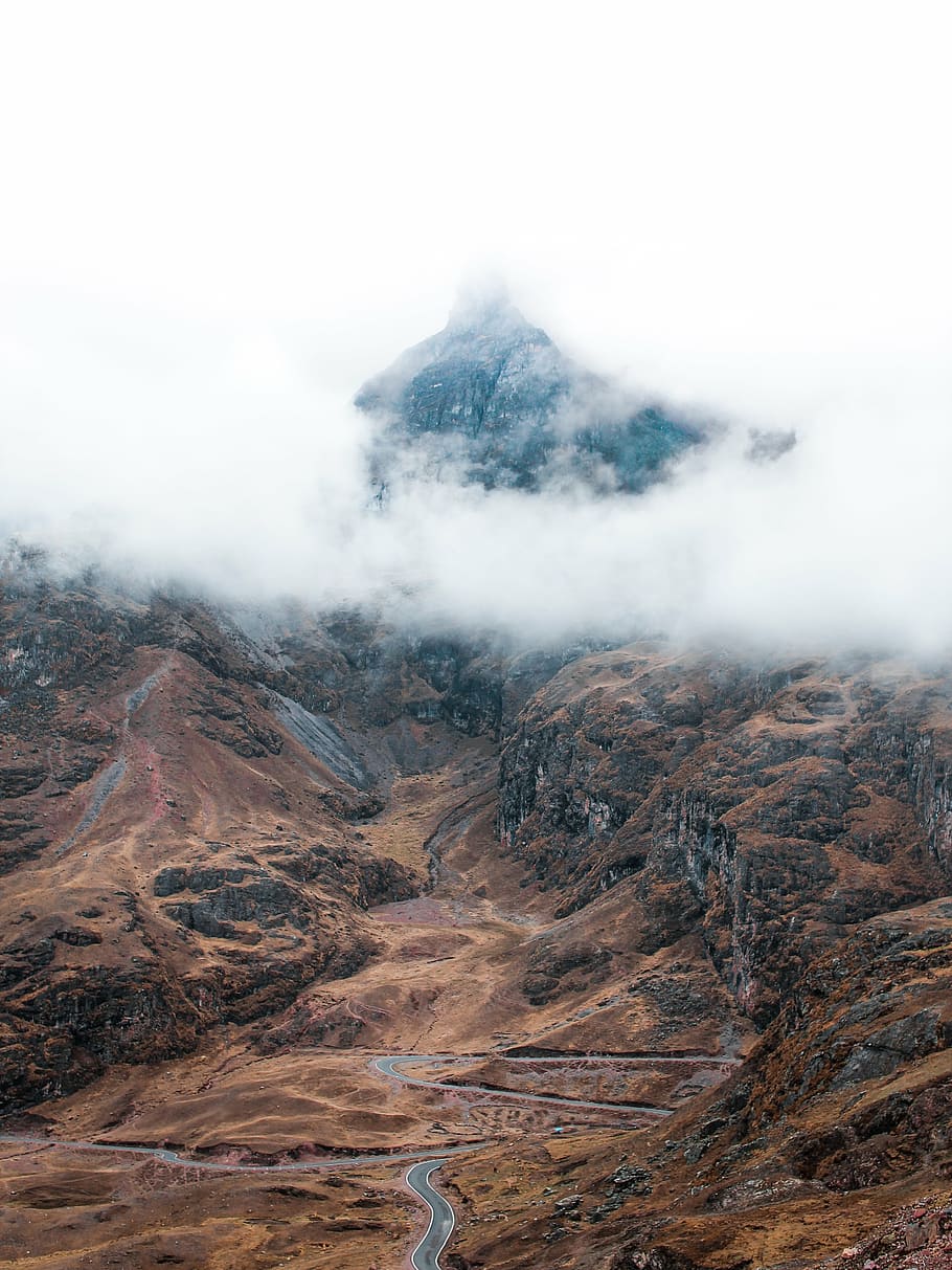 aerial photography of winding road leading to mountain, clouds HD wallpaper