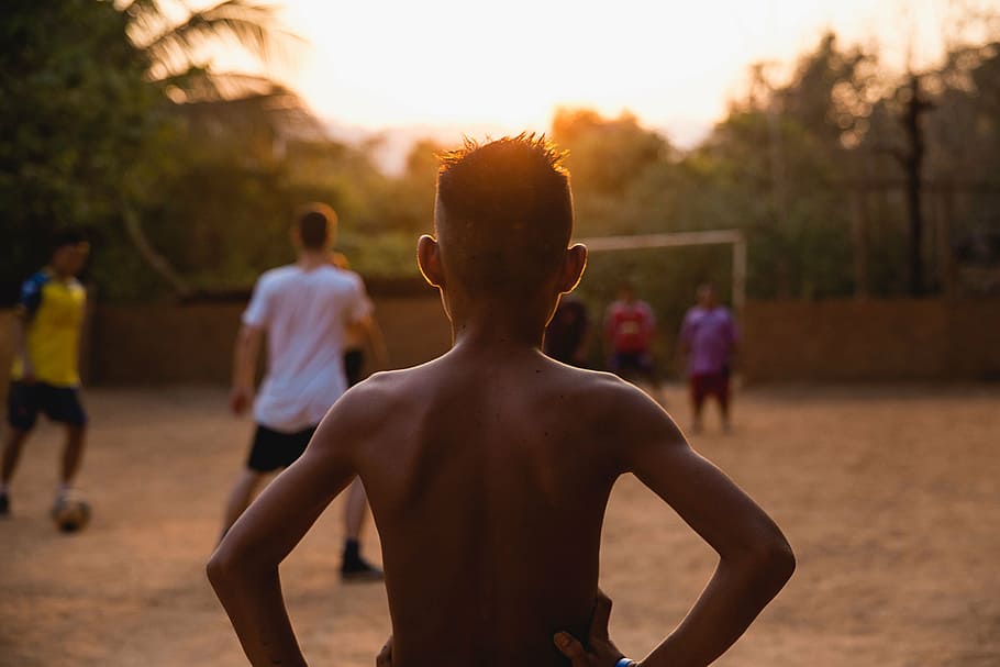 boy watching soccer game, people, playing, ball, sport, back HD wallpaper