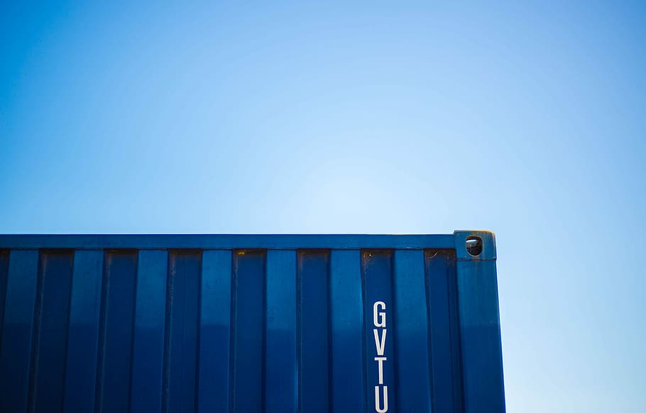 blue intermodal container, green intermodal container during daytime HD wallpaper