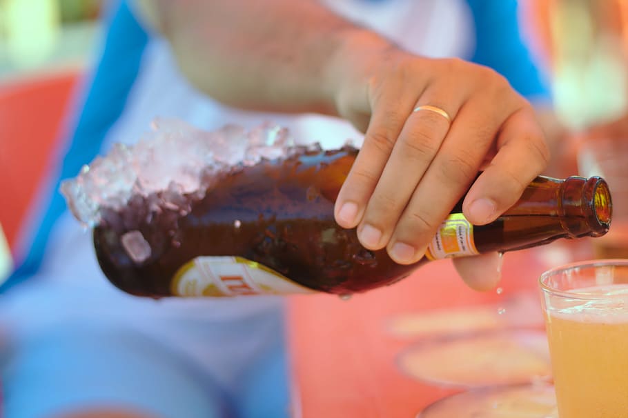 person holding amber glass bottle, beer, drink, refreshing HD wallpaper