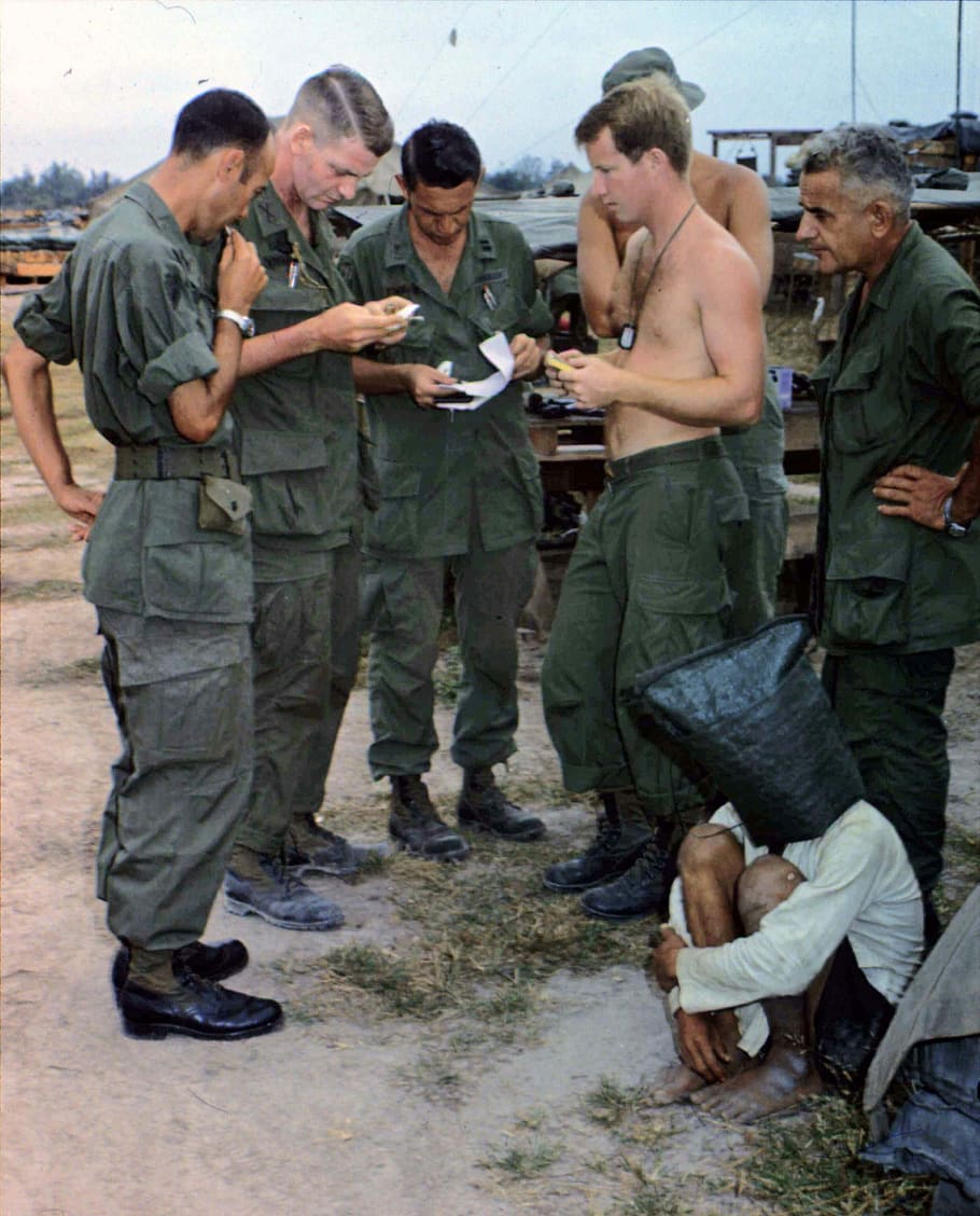 Alleged Viet Cong activist, captured during an attack on an American outpost during Vietnam War, HD wallpaper