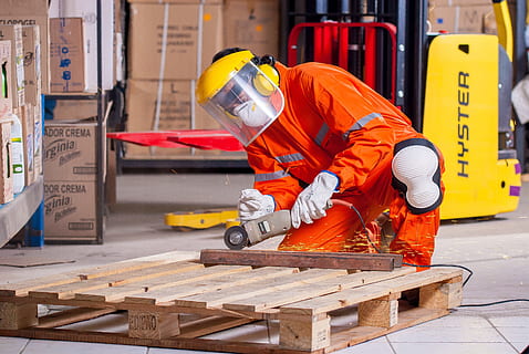 man kneeling holding angle grinder, Industrial, Security, Logistic HD wallpaper