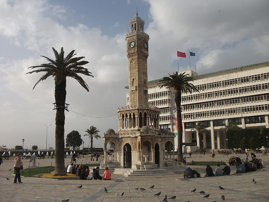 photo of birds standing near group of people during daytime, Izmir, Clock Tower
