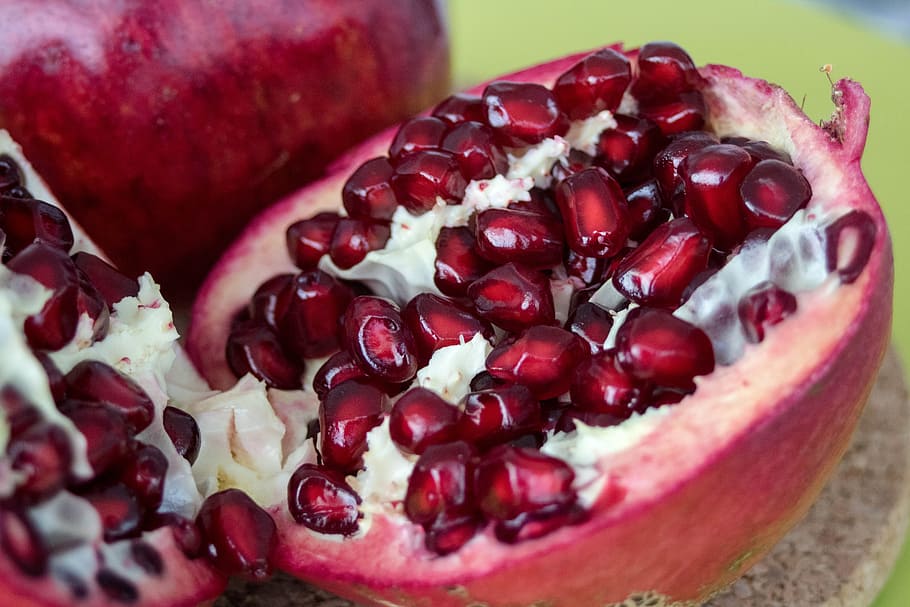 sliced red fruits with seeds, pomegranate, flavors, sweet, plant HD wallpaper