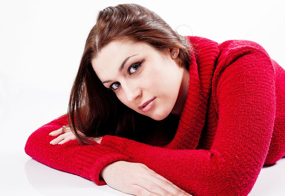 woman wearing red top, young, female, lying down, jumper, girl