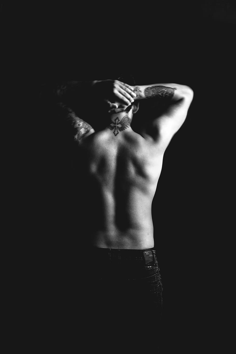 person with tattooed skin wearing black denim bottoms, back HD wallpaper