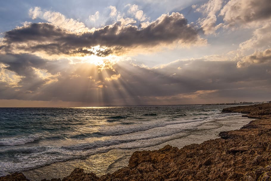 wavy sea under sun, sunset, sky, clouds, waves, sunshine, sunbeam HD wallpaper