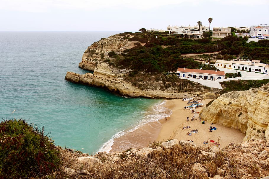 high angle photo of seashore and establishment, high angle photography of cove island during daytime HD wallpaper