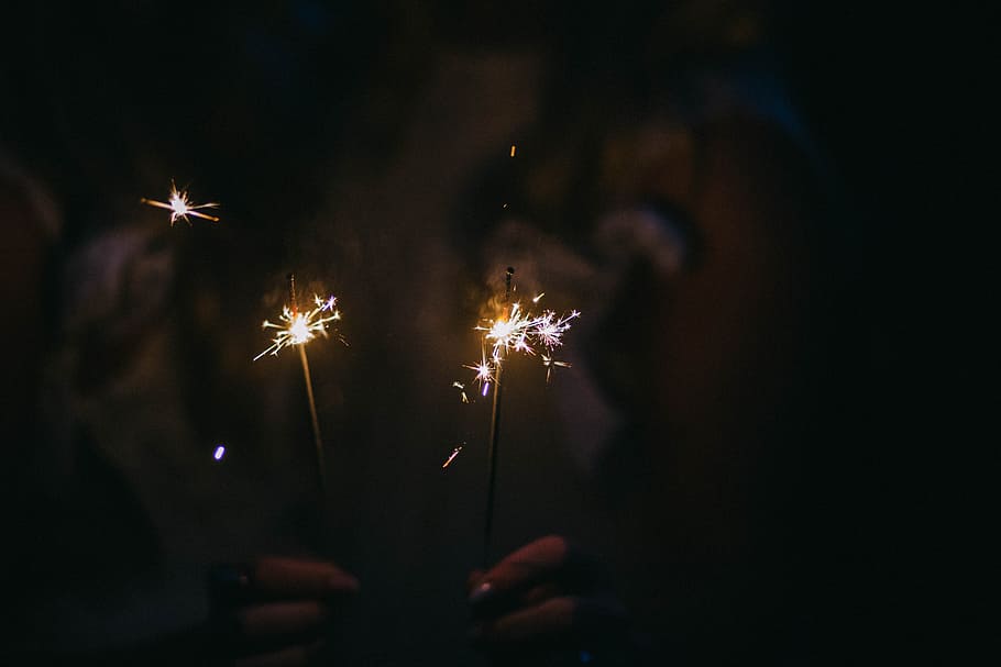 sparkling, light, dark, night, fire, hand, celebration, firework HD wallpaper