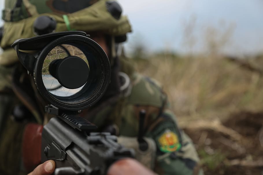 soldier using sniper scope on assault rifle, romanian soldier