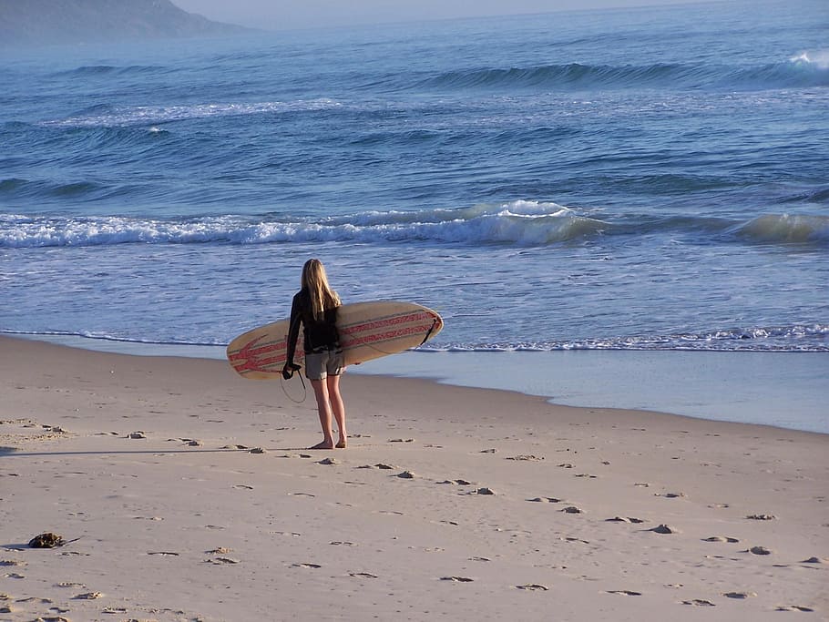 woman carrying surfboard standing on shore, Beach, Surfer, Sea, HD wallpaper