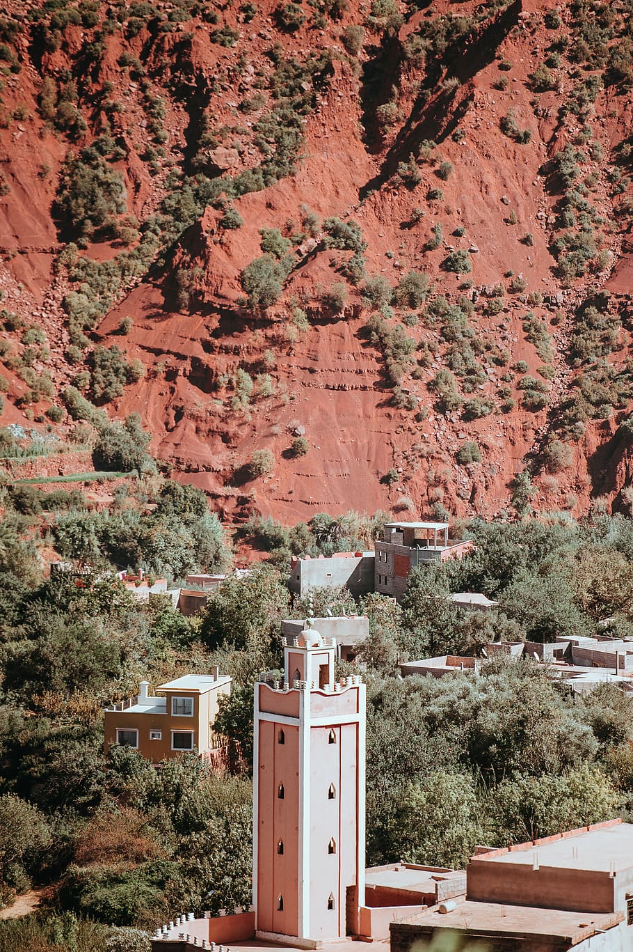 In the Atlas Mountains, aerial photography of beige buildings near mountain at daytime HD wallpaper
