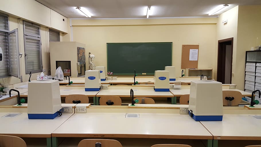white wooden desks and chairs inside room, lab, classroom, school