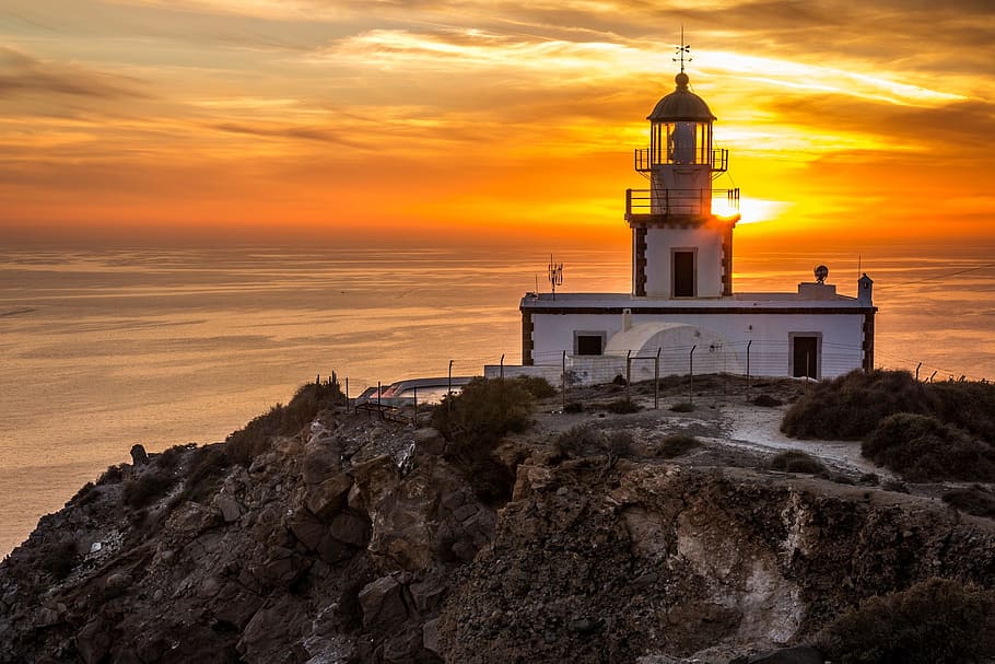 light, sea, dawn, landscape, architecture, building, cliffs, dusk HD wallpaper