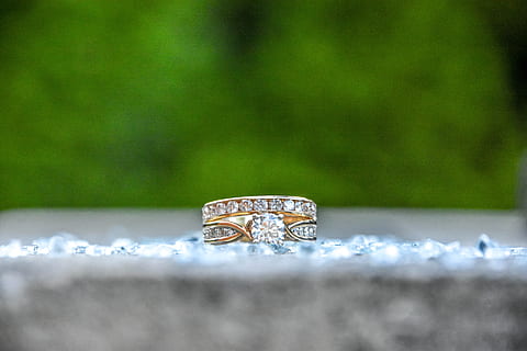 diamond beaded gold ring on concrete surface, gold-colored ring on gray floor HD wallpaper