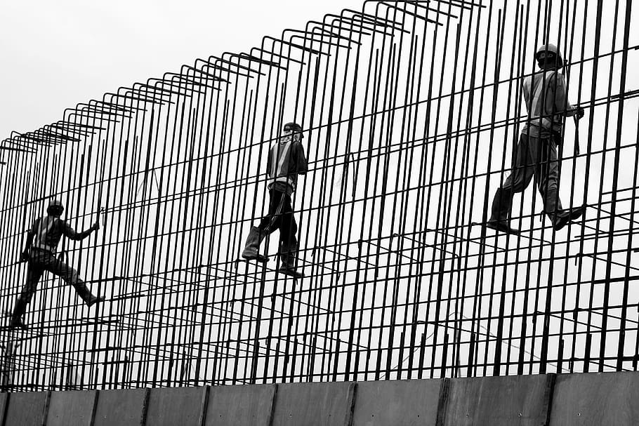 three workmen standing on gray metal rails during daytime, Construction, Worker