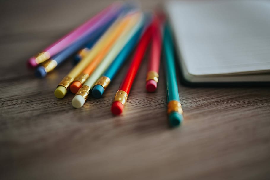 HD wallpaper: Notebooks with colourful pencils on a wooden desk, copy