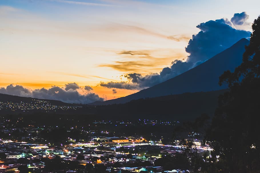 Antigua at Sunset, high angle photo of buildings with background of mountain HD wallpaper