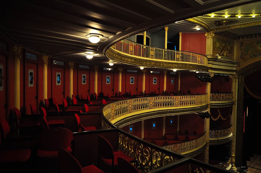 brown metal railings with red chairs behind, audience, theatre, HD wallpaper