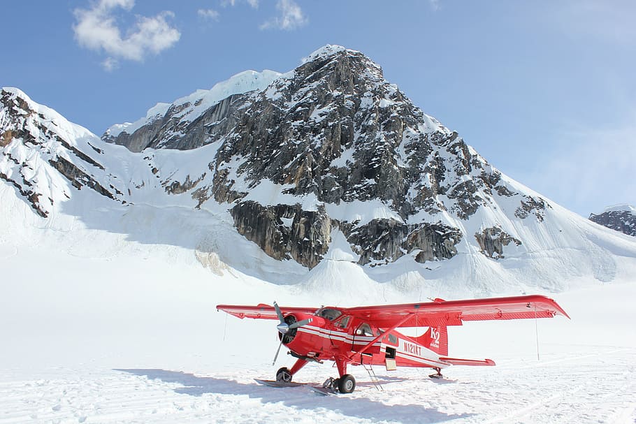 closeup photo of red airplane near mountain, alpine, altitude HD wallpaper