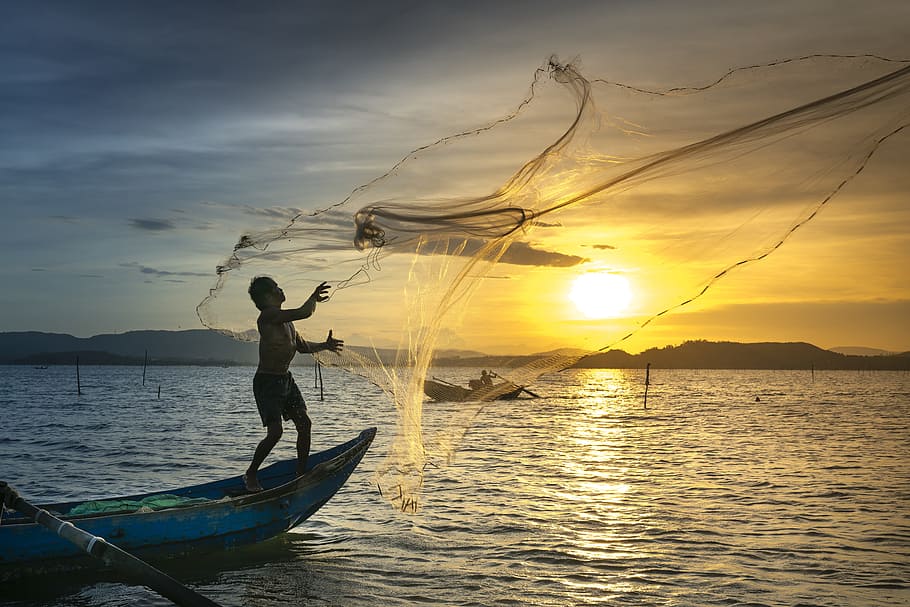 man on boat throwing fish net, the fishermen, fishing, outdoor