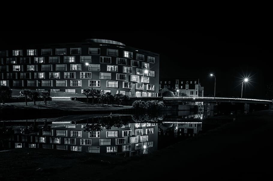 gray scale photo of high-rise building, grayscale photography of body of water near building HD wallpaper