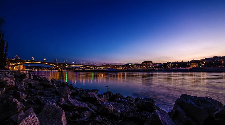 bridge near skyscrapers during sunset, long, nighttime, architecture HD wallpaper